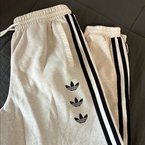 Adidas Cream and Black Sweatpants with Triple Stripe Design